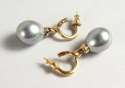 A PAIR OF BLACK PEARL EARRINGS.