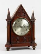 A REGENCY MAHOGANY GOTHIC DESIGN BRACKET CLOCK by GRIMALDE & JOHNSON, STRAND, with silver dial and