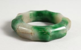 A JADE BAMBOO STYLE BANGLE. 3ins diameter.