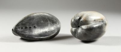 TWO MODERN FRUIT SHAPED BONE CARVINGS, POSSIBLY INUIT, with initials JM BI.