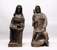 A GOOD PAIR OF 16TH /17TH CENTURY CARVED OAK RELIGIOUS FIGURES, one depicting a hooded man, a