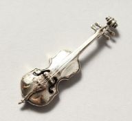 A MINIATURE SILVER VIOLIN.
