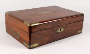 A VICTORIAN BRASS BOUND WRITING SLOPE with fitted interior. 13ins long.