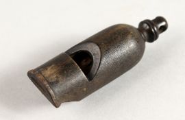 A CARVED RHINO WHISTLE. Engraved N.E.R. 2.5ins long.