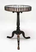 A GOOD GEORGE III CIRCULAR TOP WINE TABLE with pierced gallery, carved column on tripod legs. 2ft