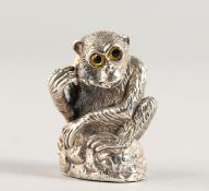 A NOVELTY SILVER MONKEY PIN CUSHION.