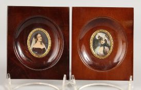 A PAIR OF OVAL PORTRAIT MINIATURES OF YOUNG LADIES in wooden frames. 1.5ins x 1ins.