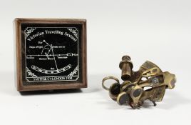 A SMALL REPRODUCTION SEXTANT, boxed. Box 4.5ins wide.
