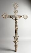 A LARGE PLATED CRUCIFIX. 33ins long.