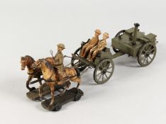 A RARE WORLD WAR I TOY, horses pulling carts.