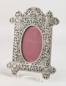 A PIERCED SILVER PHOTOGRAPH FRAME. 9.5ins x 7ins.