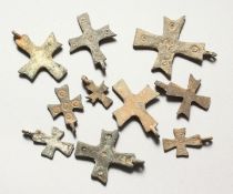 TEN SMALL ROMAN METAL CROSSES.
