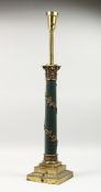 A CLASSICAL STYLE COLUMN SHAPED TABLE LAMP. 33ins high.