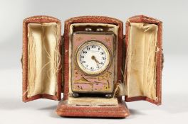 A MINIATURE SILVER CARRIAGE CLOCK, with chinoiserie decorated case, in a leather travelling case.