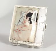 A SILVER CIGARETTE CASE, later decorated with a female nude. 3.25ins x 3ins.