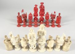 A GOOD MIXED SET OF CHINESE AND ENGLISH CARVED AND STAINED IVORY/BONE CHESS PIECES. (32)