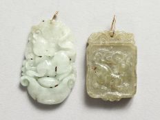 TWO SMALL JADE PENDANTS. 1.25ins.