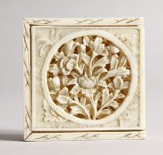 A CANTON SQUARE, CARVED AND PIERCED PUZZLE, four pieces in two layers. 2ins square.