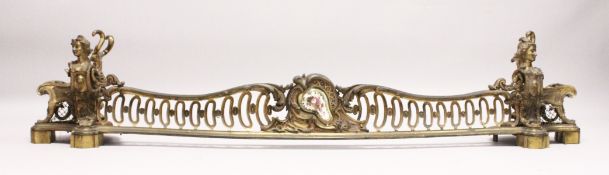 A VERY GOOD LOUIS XVITH ORMOLU SERPENTINE FRONTED FENDER with pierced front and female heads. 5ft