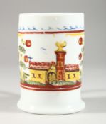 A MILCH GLASS TANKARD painted with buildings. 4.25ins high.