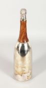 A NOVELTY PLATED AND TURNED WOOD CHAMPAGNE BOTTLE COCKTAIL SHAKER. 14ins high.