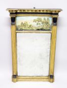 A REGENCY GILTWOOD PIER MIRROR, with painted glass panel and sphinx supports. 3ft 6ins high x 2ft