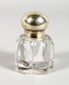 A SILVER TOP GLASS INKWELL.