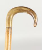 A 19TH CENTURY WALKING STICK with RHINO HANDLE. 35ins long.