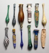 A COLLECTION OF TWELVE ROMAN/EGYPTIAN-STYLE DECORATIVE GLASS PIECES.
