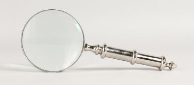 A MAGNIFYING GLASS.