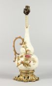 A PORCELAIN URN SHAPED JUG as a lamp, with gilt metal mounts. 21ins high overall.