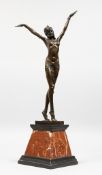 AN ART DECO STYLE BRONZE OF A DANCER on a tapering square marble base. 22ins high.