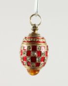 A RUSSIAN SILVER AND ENAMEL MINIATURE EGG SHAPED PENDANT.