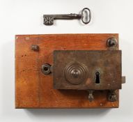 AN 18TH CENTURY FRENCH DOUBLE ACTION LOCK AND KEY with Cloverleaf (Trefle) Shaped Drill Pin, a