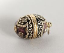 A RUSSIAN SILVER AND ENAMEL MINIATURE EGG SHAPED PENDANT.