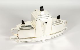 AN ART DECO STYLE THREE PIECE PLATED TEA SERVICE.