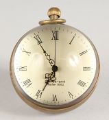 A NOVELTY BALL SHAPED DESK CLOCK.