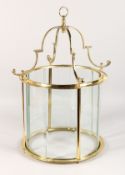 A GOOD BRASS HANGING LANTERN with bevelled glass panels. 21ins high.