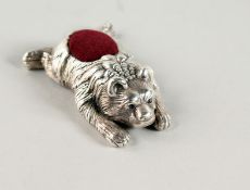 A NOVELTY SILVER BEAR PIN CUSHION.