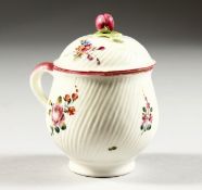 A MID 18TH CENTURY MENNECY CUSTARD CUP AND COVER or pot a jus, spirally moulded and painted with