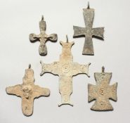 FIVE MEDIUM ROMAN METAL CROSSES.