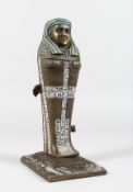 AN AUSTRIAN PAINTED COLD CAST BRONZE NOVELTY SARCOPHAGUS, opening to reveal a standing female