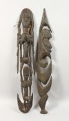 A PAIR OF CARVED WOOD SEPTIK PANELS. 36ins long.