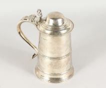 A GEORGE III SILVER LIDDED TANKARD, London 1808. 24ozs. 8.5ins high.