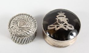 A SILVER AND TORTOISESHELL PILL BOX and A CIRCULAR PILL BOX