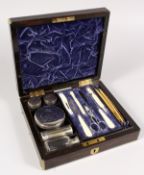 A VERY GOOD VICTORIAN COROMANDEL BRASS BOUND VANITY CASE by A. F. DONAGAN, CAMBRIDGE, with blue