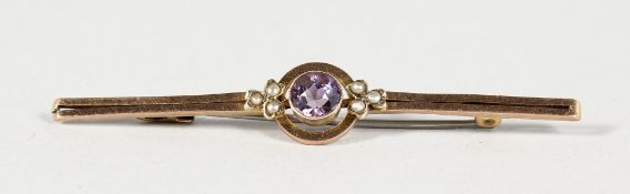 A 9CT GOLD BAR BROOCH.