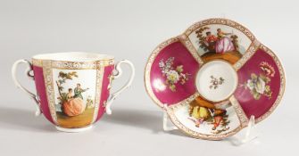 A DRESDEN TWO-HANDLED CUP AND SAUCER with panels of figures and flowers.