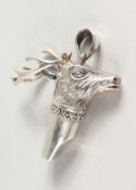 A NOVELTY SILVER DEER'S HEAD WHISTLE.