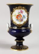 A GOOD 19TH CENTURY MEISSEN RICH BLUE URN SHAPED VASE, painted with a panel of flowers. Cross swords